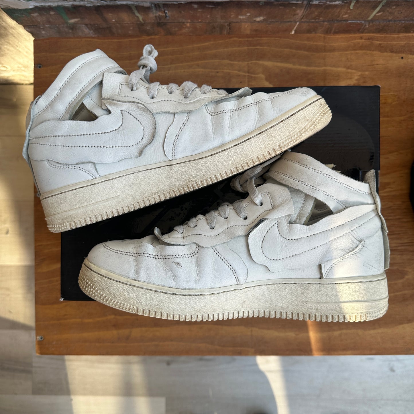 CDG x Nike Air Force 1 Mid Size 10